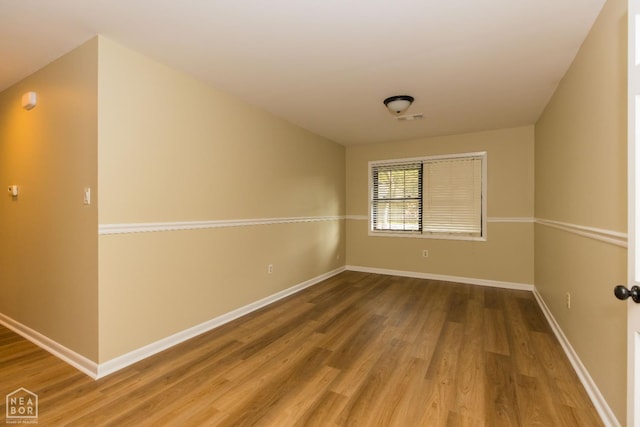 1805 Covey Dr, Jonesboro, AR 72404 - empty room featuring wood finished floors