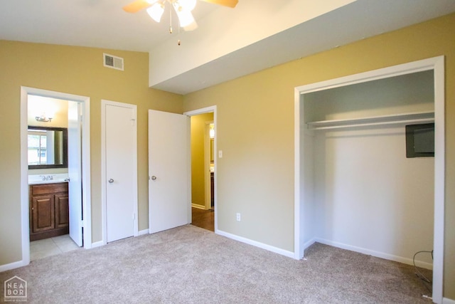 1805 Covey Dr, Jonesboro, AR 72404 - unfurnished bedroom featuring light colored carpet, a closet, ensuite bath, and lofted ceiling