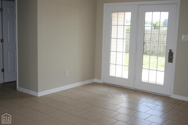 1805 Covey Dr, Jonesboro, AR 72404 - spare room with plenty of natural light and light tile patterned flooring