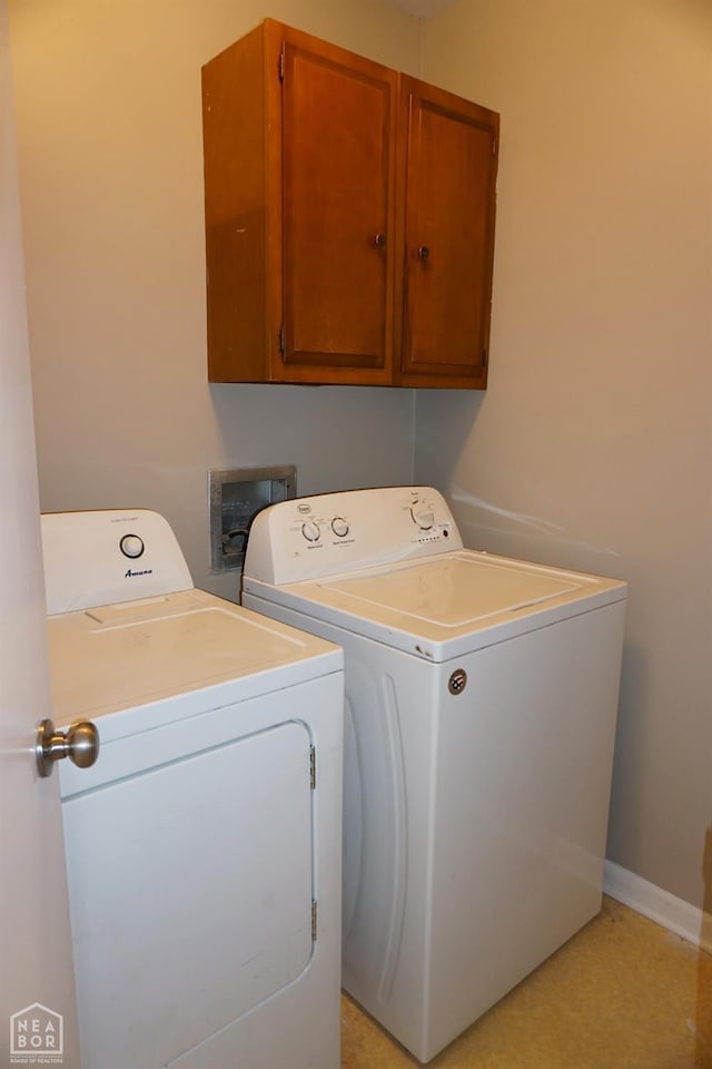 1805 Covey Dr, Jonesboro, AR 72404 - washroom with washer and clothes dryer and cabinet space