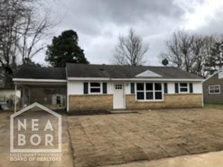 1805 Covey Dr, Jonesboro, AR 72404 - ranch-style home with a carport and driveway