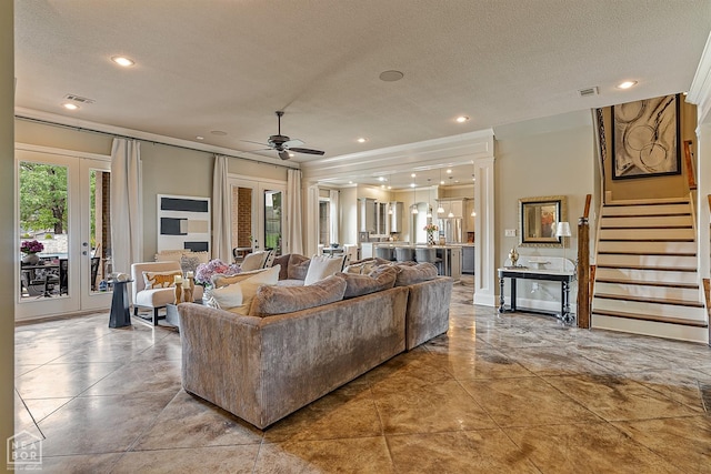 living room with a ceiling fan, french doors, visible vents, and recessed lighting
