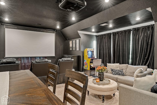home theater with vaulted ceiling, visible vents, and recessed lighting