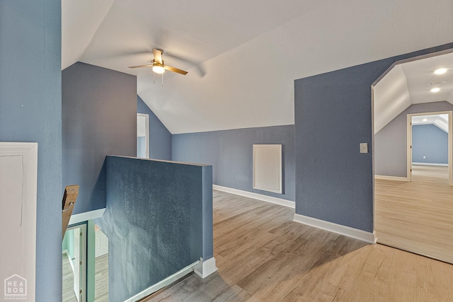 615 W Main St W, Trumann, AR 72472 - bonus room with a ceiling fan, lofted ceiling, wood finished floors, and baseboards