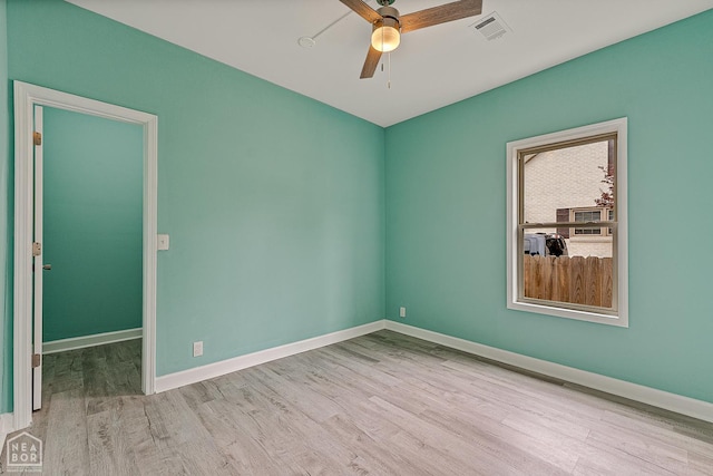615 W Main St W, Trumann, AR 72472 - unfurnished room featuring wood finished floors, a ceiling fan, and baseboards