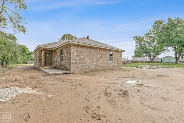 305 Carol Ave, Monette, AR 72447 - back of property featuring brick siding