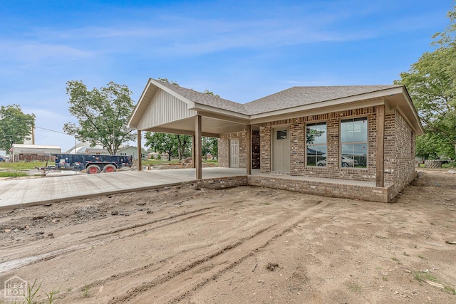 305 Carol Ave, Monette, AR 72447 - view of front of property featuring brick siding and a shingled roof