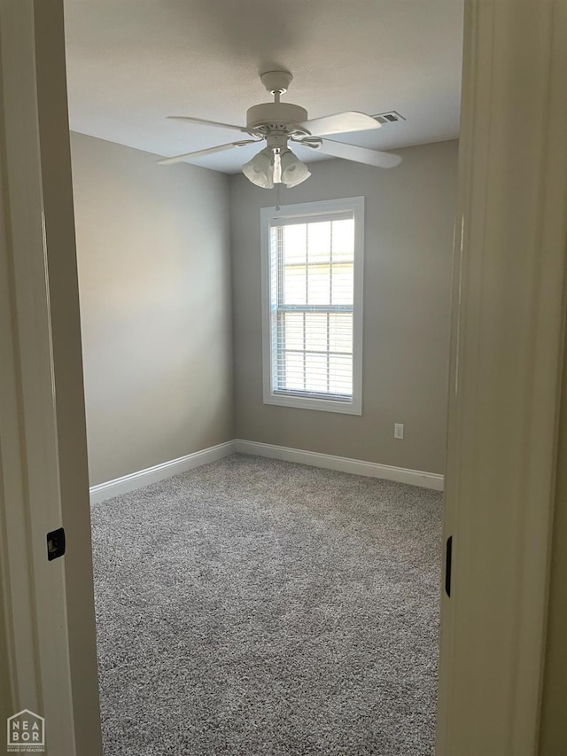 997 Russell Hill Dr, Jonesboro, AR 72404 - carpeted empty room featuring baseboards and a ceiling fan
