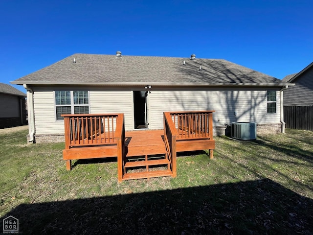 997 Russell Hill Dr, Jonesboro, AR 72404 - rear view of house featuring central air condition unit, a yard, a shingled roof, and a deck