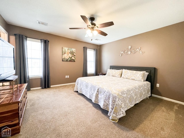 bedroom with baseboards, carpet floors, and ceiling fan