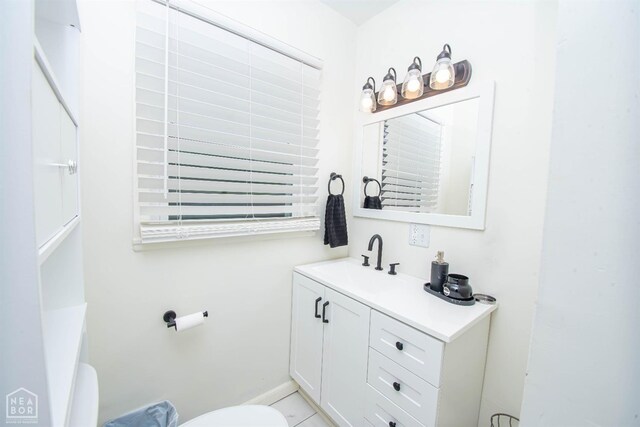 1123 Olive St, Jonesboro, AR 72401 - bathroom with vanity and toilet