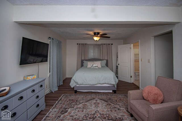 1123 Olive St, Jonesboro, AR 72401 - bedroom with dark wood finished floors, ceiling fan, and baseboards