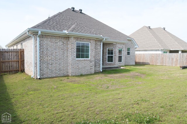 113 Hidden Creek Dr, Brookland, AR 72417 - back of house featuring roof with shingles and brick siding