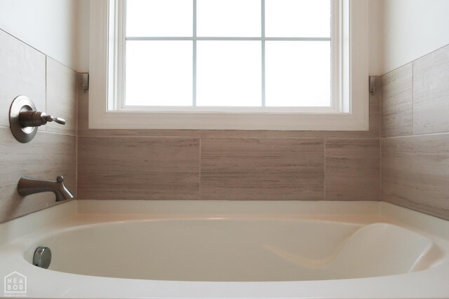 113 Hidden Creek Dr, Brookland, AR 72417 - bathroom featuring a tub to relax in