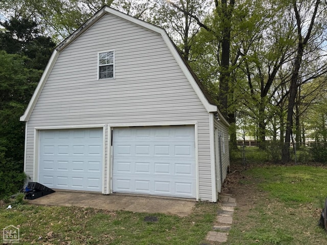 detached garage with fence