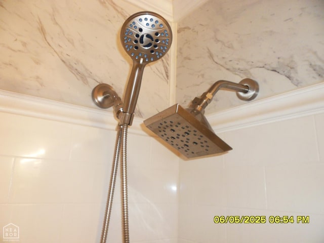 404 Logan St, Newport, AR 72112 - bathroom view of a tile shower and ornamental molding