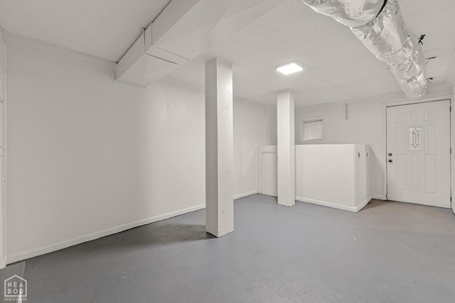 finished below grade area featuring baseboards