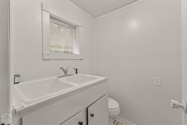bathroom featuring tile walls, toilet, tile patterned flooring, and vanity