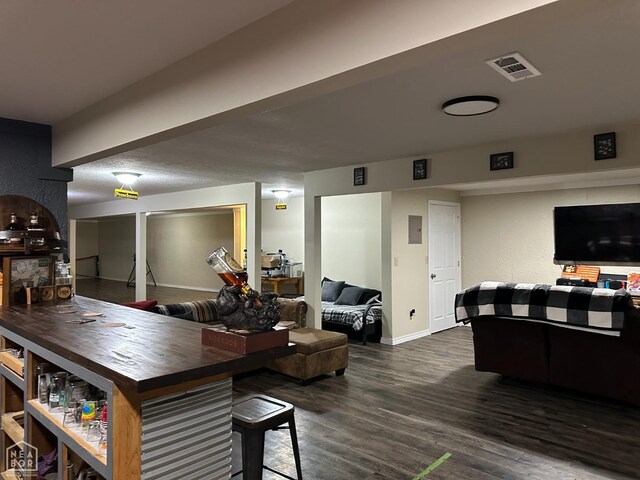 13534 Mc 8001, Yellville, AR 72687 - living room featuring wood finished floors, baseboards, and visible vents
