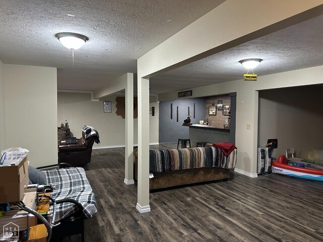 13534 Mc 8001, Yellville, AR 72687 - finished below grade area with baseboards, wood finished floors, and a textured ceiling