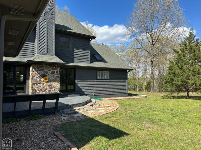 13534 Mc 8001, Yellville, AR 72687 - back of house with french doors, a shingled roof, stone siding, and a yard