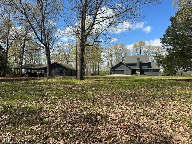 13534 Mc 8001, Yellville, AR 72687 - view of yard with a garage