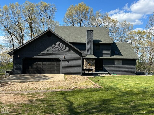 13534 Mc 8001, Yellville, AR 72687 - view of front of property featuring a front yard, driveway, a garage, and a chimney