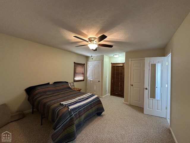 13534 Mc 8001, Yellville, AR 72687 - bedroom with baseboards, light carpet, and a textured ceiling