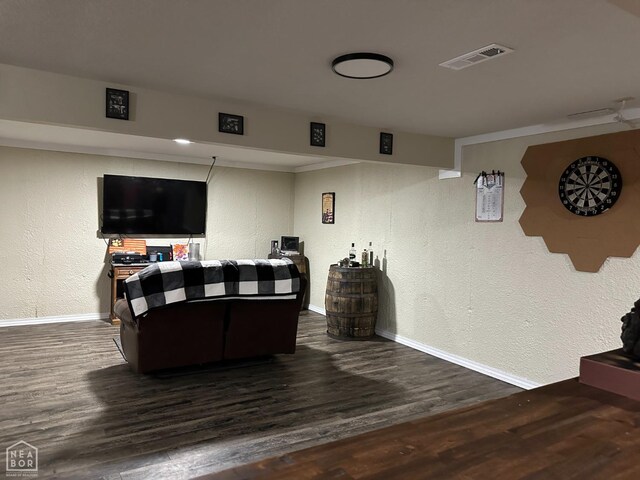 13534 Mc 8001, Yellville, AR 72687 - living room featuring wood finished floors, a textured wall, baseboards, and visible vents