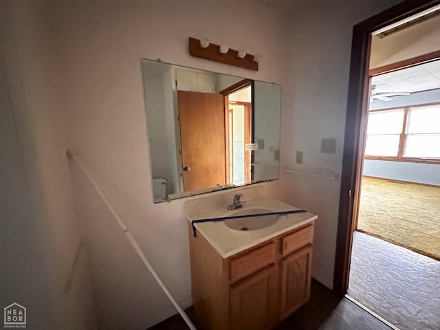 bathroom featuring vanity and a ceiling fan