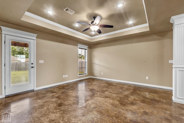 398 Wildwood Pt, Jonesboro, AR 72405 - empty room with crown molding, ceiling fan, a raised ceiling, finished concrete floors, and visible vents