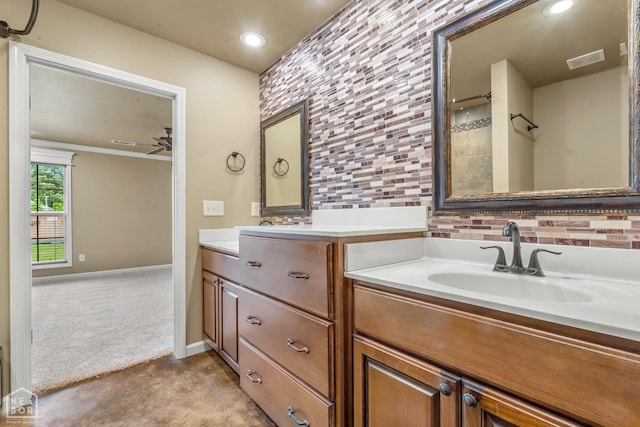 398 Wildwood Pt, Jonesboro, AR 72405 - full bath with double vanity, visible vents, tasteful backsplash, a sink, and recessed lighting