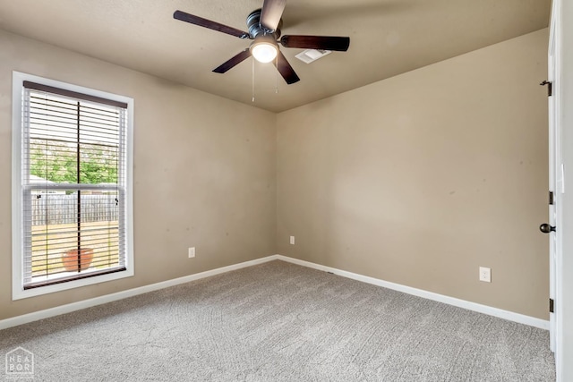398 Wildwood Pt, Jonesboro, AR 72405 - carpeted spare room with baseboards and ceiling fan