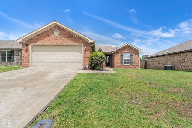 398 Wildwood Pt, Jonesboro, AR 72405 - ranch-style house featuring driveway, a front yard, and a garage
