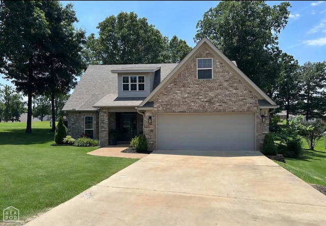 3305 Winged Foot Cv, Jonesboro, AR 72405 - craftsman inspired home featuring an attached garage, brick siding, a front lawn, concrete driveway, and a shingled roof