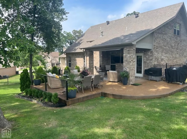 3305 Winged Foot Cv, Jonesboro, AR 72405 - rear view of property with brick siding, a patio, and a shingled roof