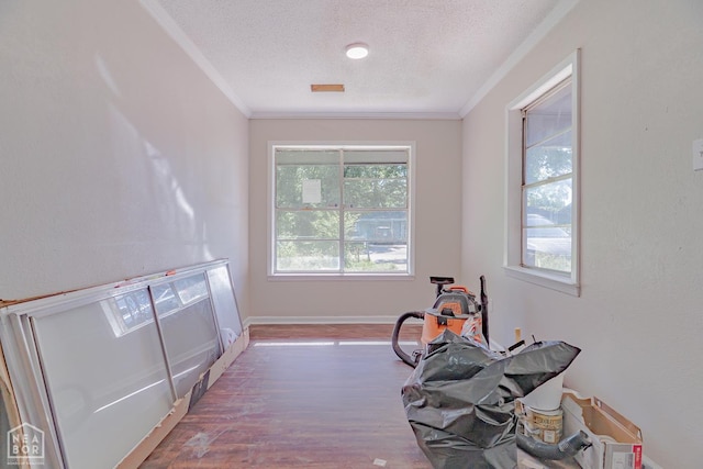 325 S 12th St, West Memphis, AR 72301 - interior space with crown molding, wood finished floors, a textured ceiling, and baseboards