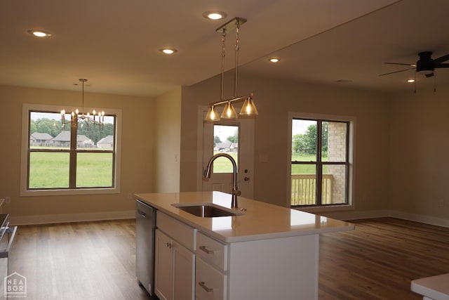 1804 N Oak St, Brookland, AR 72417 - kitchen with a sink, stainless steel dishwasher, wood finished floors, baseboards, and recessed lighting
