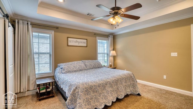 509 Wiregrass Way, Jonesboro, AR 72405 - carpeted bedroom featuring multiple windows, crown molding, a raised ceiling, and a ceiling fan