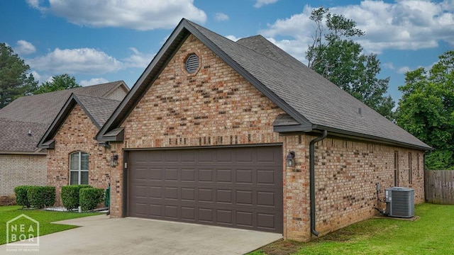 509 Wiregrass Way, Jonesboro, AR 72405 - view of side of home featuring brick siding, a garage, concrete driveway, and a shingled roof