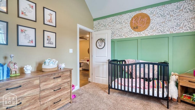 509 Wiregrass Way, Jonesboro, AR 72405 - bedroom with vaulted ceiling, carpet floors, wallpapered walls, a wainscoted wall, and a decorative wall