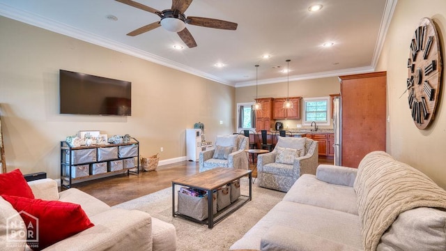 509 Wiregrass Way, Jonesboro, AR 72405 - living room featuring a ceiling fan, recessed lighting, and crown molding