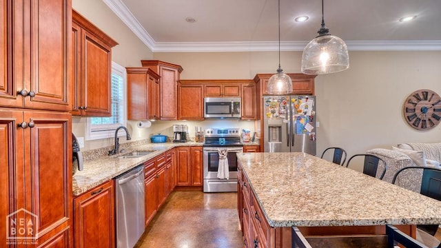509 Wiregrass Way, Jonesboro, AR 72405 - kitchen featuring appliances with stainless steel finishes, a breakfast bar, a kitchen island, light stone countertops, and brown cabinets