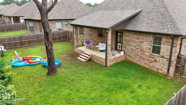 509 Wiregrass Way, Jonesboro, AR 72405 - fenced backyard featuring a patio
