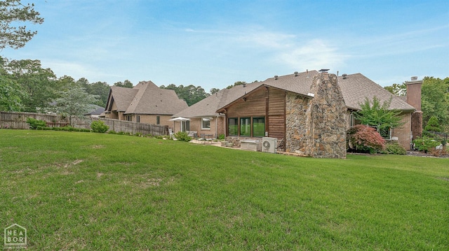 3821 Pebble Beach Dr, Jonesboro, AR 72404 - rear view of property featuring a chimney, stone siding, ac unit, and a shingled roof