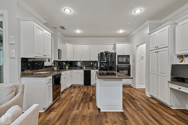 3821 Pebble Beach Dr, Jonesboro, AR 72404 - kitchen featuring black appliances, a sink, white cabinetry, dark wood-type flooring, and ornamental molding