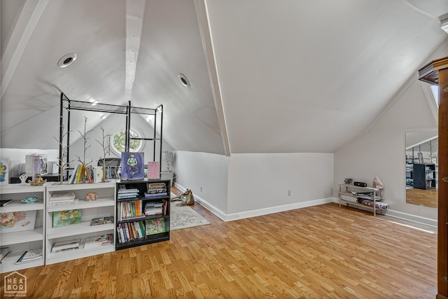 3821 Pebble Beach Dr, Jonesboro, AR 72404 - bonus room featuring lofted ceiling, wood finished floors, and baseboards