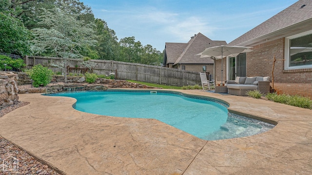3821 Pebble Beach Dr, Jonesboro, AR 72404 - view of swimming pool featuring a patio, a fenced backyard, and outdoor lounge area