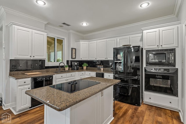 3821 Pebble Beach Dr, Jonesboro, AR 72404 - kitchen with black appliances, a sink, ornamental molding, white cabinets, and tasteful backsplash