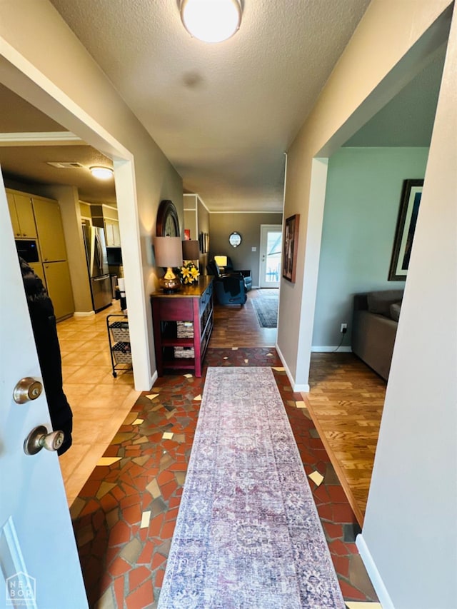 2804 Ivy Dr, Newport, AR 72112 - corridor with baseboards and a textured ceiling
